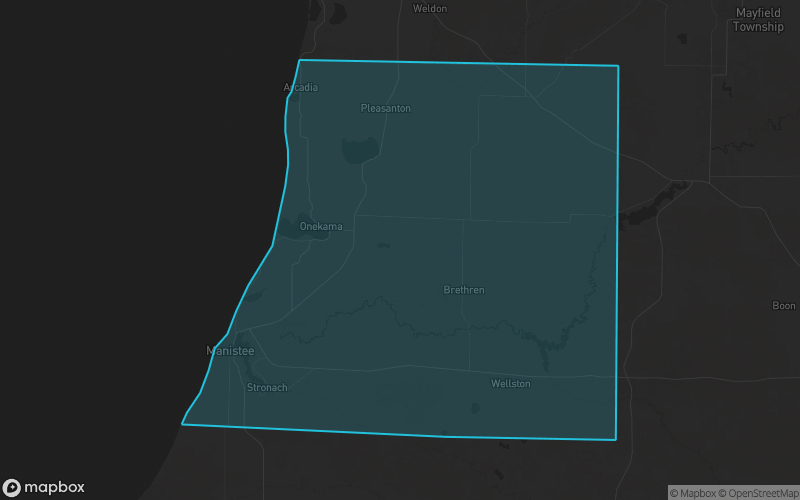 Map of Manistee County, Michigan showing the county boundary and surrounding cities